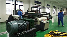Butyl rubber tape extruding coating machine